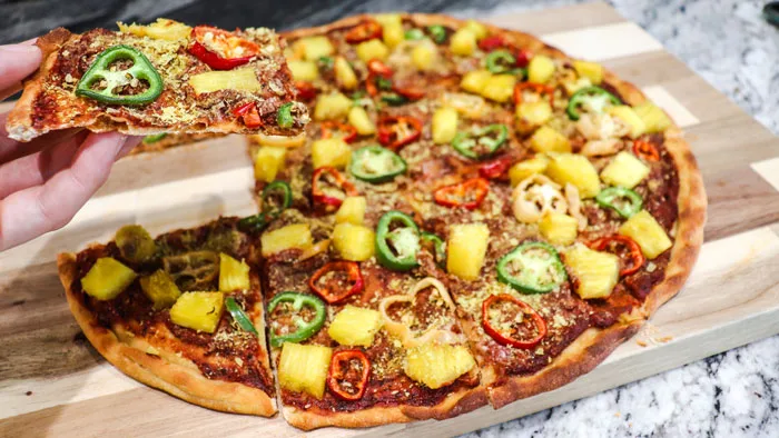 Garbanzo (chickpea) flour crispy thin pizza crust with peppers and pineapple
