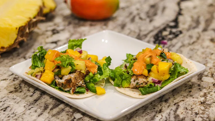 fish tacos with tropical salsa and siracha mayo
