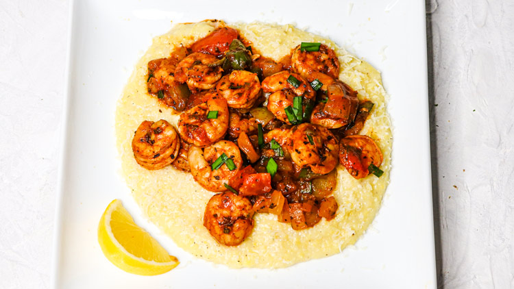 Healthy Shrimp and Grits served on a white plate